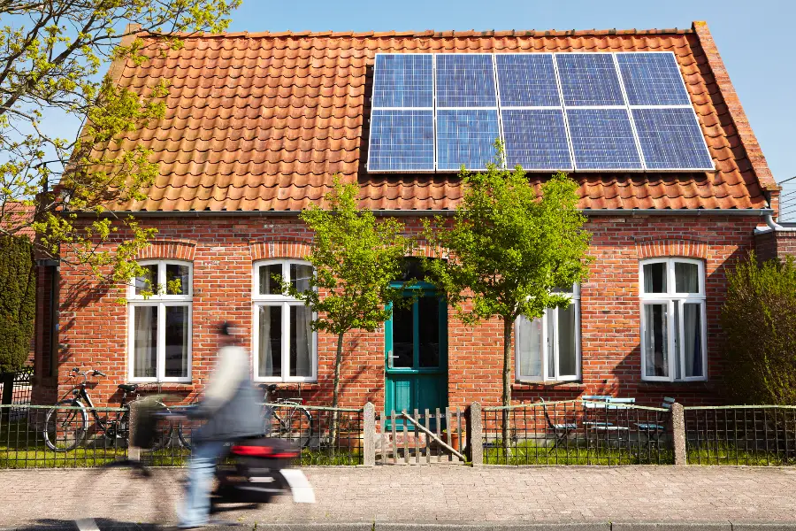 brick house with solar panels